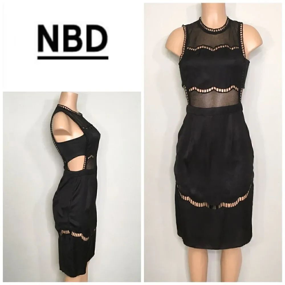 New. NBD black cut out lace trimmed dress.